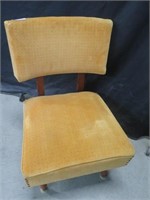 YELLOW UPHOLSTERY ROCKING CHAIR