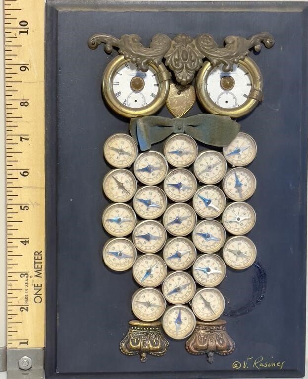 OWL figure made up of compasses and pocket watches