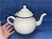 White enamelware teapot