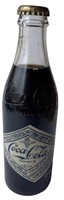 One 75th Anniversary Coca Cola Bottle