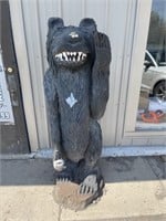 Wood carved bear statue