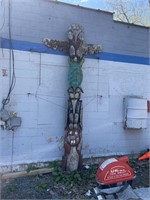 Wood carved totem pole