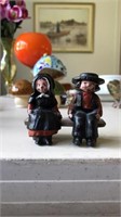 CASTIRON AMISH MAN AND WOMEN ON BENCH, TOY