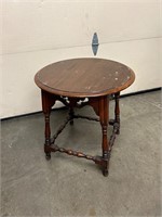 Circular wood side table
