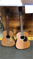 2 wood guitars