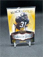2008 EXQUISITE BLACK AND GOLD DONNIE SHELL AUTO
