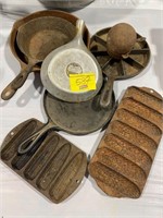 GROUP OF UNMARKED CAST IRON SKILLETS, CORN PANS,