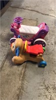2 kids riding toys