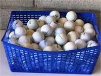 Large Container with practice golf balls