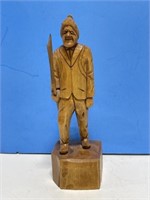 Quebec Wooden Hand Carved man with a Pack Sack on