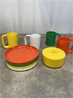 Heller mugs and plastic dish plates