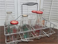6 milk bottles in wire tote - nice - we are