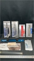 Various trowels, Empire Cutting Guide, grout