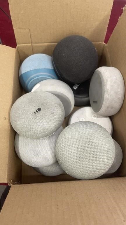Lot of Google Homes, echo dots and speakers