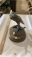 Metal bird statue