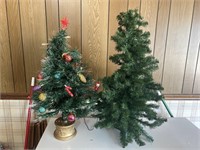 2  Christmas trees 24” tall