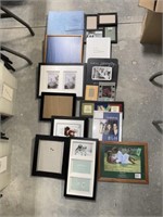 Assortment of Photo Frames and Photo Album