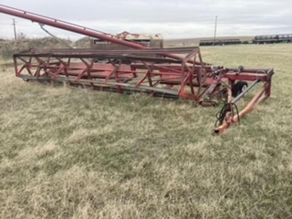White Pto 28 ft swather not running. For parts.
