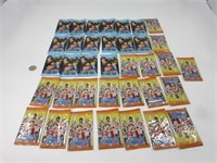 Plusieurs paquets neufs de cartes One Piece