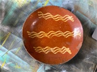 antique pottery bowl with wavy lines