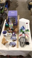 Various Eeyore stuffed animals and decorations