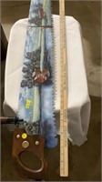Painted saw, approximately 5’ long