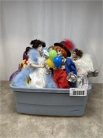 Large lot of porcelain dolls including clown doll