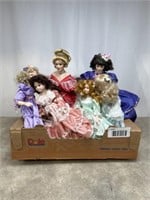 Porcelain dolls, various sizes. Tallest is