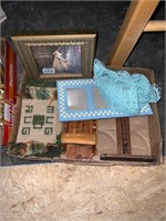 lot of frames, mug rugs, and wooden things