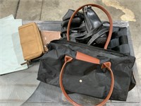 lot of purses and bags