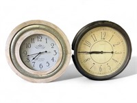Two 24 inch wall clocks battery operated.