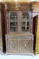 French Hunt Carved Oak Bookcase.
