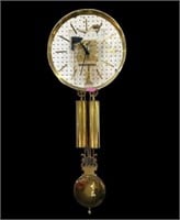 Howard Miller Two Weight Brass And Glass Clock.
