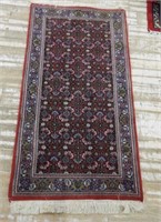 Hand Knotted Rug.