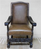 Nail Head Trimmed Brown Leather Armchair.