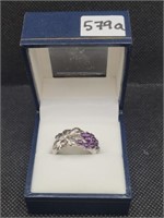 $130 size 7.5 silver tone Ring