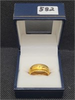 $160 size 7 gold tone movable ring