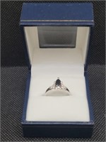 $90 size 7 silver tone ring