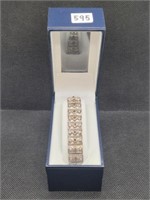$120 silver tone bracelet