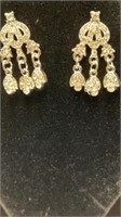 Silver coloured earrings