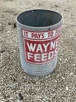 Wayne feeds Chicken feeder part