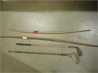 (2) Wooden Recurve Bows, (2) Vintage Golf Clubs