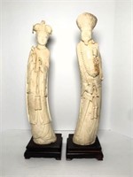 Pair of Asian Figural Sculptures on Wood Stands