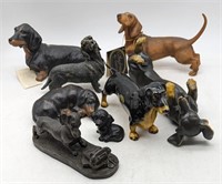 (M) Dachshund figures and coin bank. Largest is