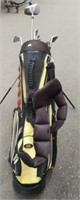 Black/Yellow Golf Bag w/ 8 Golf Clubs