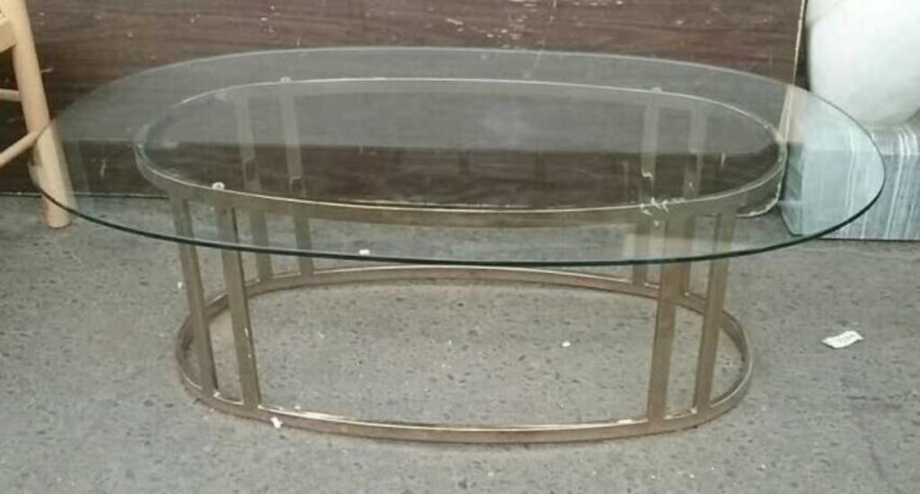 Glass Top Oval Coffee Table With Gold Finish