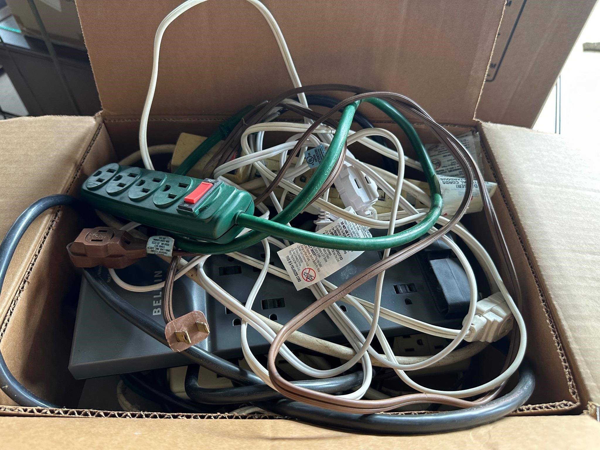 Box of Misc Extension Cords & Surge Protectors