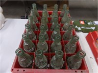 Case of coke bottles