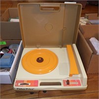 VINTAGE FISHER PRICE RECORD PLAYER- TURNS ON