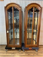Pair of Pulaski Arch Top Lighted Curio Cabinets